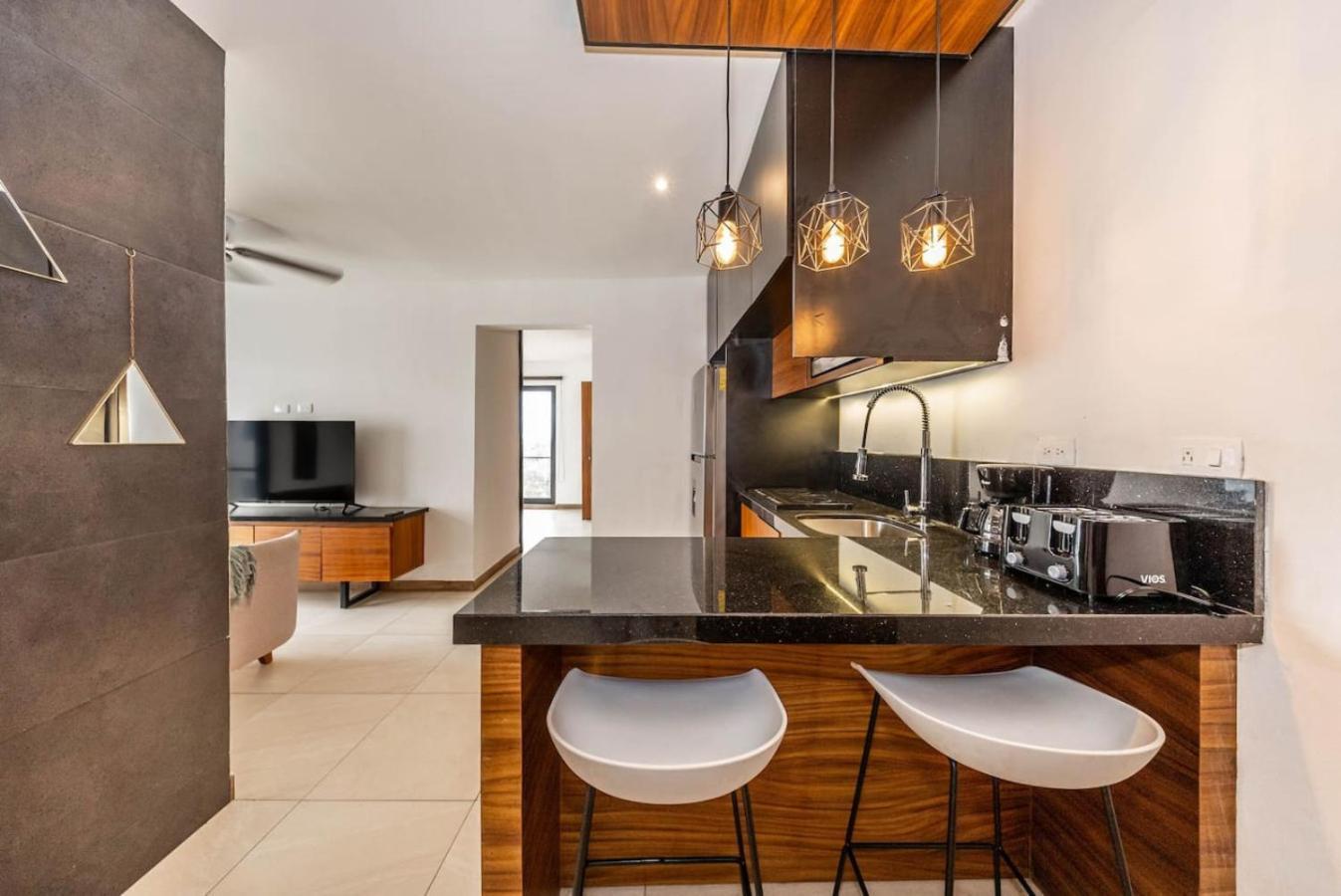 Сasa de vacaciones 2 Bedroom Oasis With Incredible Rooftop Pool